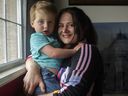 Carolyn Hofbauer with her two-and-a-half-year-old son Blake at their home in Surrey, BC., June 21, 2022. When a child care center gets picked by to be a $10-a-day site, parents say it's like winning the lottery.  By the end of the year, the BC government will double the number of subsidized $10-a-day spots from 6,500 to 12,500.
