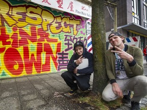 DTES artists Smokey D and Trey Helten painted murals over graffiti in Chinatown, as a way to ease tensions between the two communities.