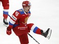 Russia's Andrei Kuzmenko celebrates after scoring his side's second goal during the Channel One Cup ice hockey match between Russia and Czech Republic in Moscow, Russia, Saturday, Dec. 19, 2020.