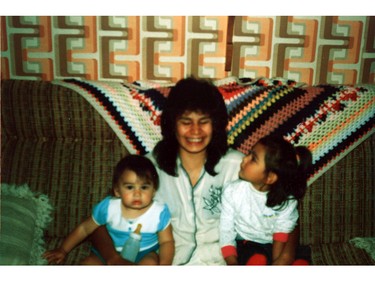 Sharon Abraham, who was last seen in 2000, with her daughters in 1990.