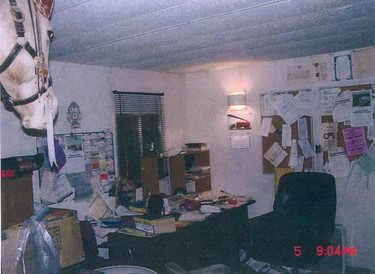 A photo entered in to evidence in the murder trial of Robert William Pickton in Port Coquitlam: Pickton's cluttered office, with the stuffed head of his pet horse Goldie in the upper left hand corner.
