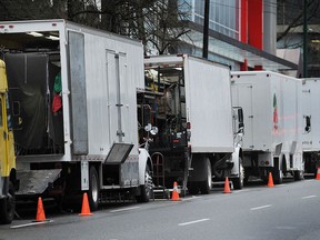 Film trucks line Seymour Street in Vancouver in a file photo. The Directors Guild of Canada B.C. has reached a tentative agreement with producers.