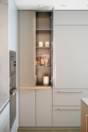 A pantry provides plenty of storage space in the kitchen.