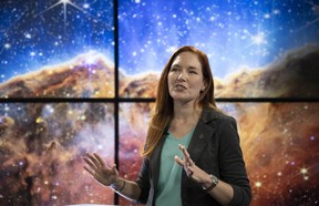 JULY 12: In this handout photo provided by NASA, NASA James Webb Space Telescope Deputy Project Scientist for Communications Amber Straughn speaks about the infrared image of the star-forming region called NGC 3324 in the Carina Nebula as it is shown on a screen during a broadcast releasing the telescopes first full-color images on July 12, 2022, at NASAs Goddard Space Flight Center in Greenbelt, Maryland. The first full-color images and spectroscopic data from the James Webb Space Telescope, a partnership with ESA (European Space Agency) and the Canadian Space Agency (CSA), are a demonstration of the power of Webb as the telescope begins its science mission to unfold the infrared universe.