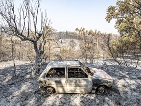 ALVAIAZERE, PORTUGAL - JULY 15: This photograph shows a burnt car at Mouta on July 15, 2022 in Alvaiazere, Portugal. Wildfires have swept across the central part of the country amid temperatures exceeding 40 degrees celsius.