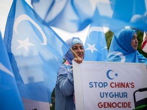 JULY 5: Supporters of the East Turkistan National Awakening Movement rally in front of the White House to commemorate the 13th anniversary of the July 5th Urumqi Massacre, July 5, 2022 in Washington, DC.