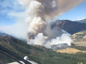 A wildfire blazing west of Lytton, B.C., as shown in an image provided by the B.C. Wildfire Service.