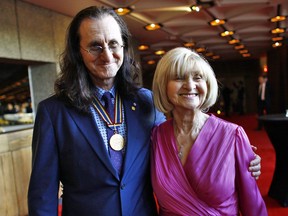 Rush singer Geddy Lee says his mother Mary Weinrib, seen here with him in 2012, was open about her experience in concentration camps in Germany. New software has identified photos of Weinrib, who died in 2021, in one camp.