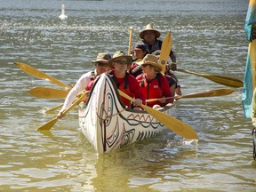 Canoes pull into Mara Lake Provincial Park Tuesday on the first first day of the Pulling Together Canoe Journey.The journey is hosted by the Splatsin, Cstélnec (Adams Lake), Simpcw, and Tsq’escenemc (Canim Lake) First Nations.