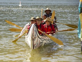 The canoes enter Mara Lake Provincial Park on Tuesday on the first day of the Pulling Together canoe trip.  The trip is organized by the Splatsin, Cstélnec (Adams Lake), Simpcw and Tsq'escenemc (Canim Lake) First Nations.