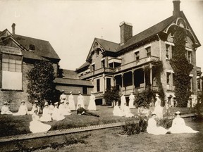 Man and nurses on lawn in front of the Vancouver City Hospital - 530 Cambie Street, 1902. Vancouver Archives AM54-S4-: Bu P369