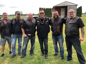 Zale Coty, Hells Angels associate and member of the Throttle Lockers biker gang, on the far right, with other members of the Okanagan Throttle Lockers. Coty's Kamloops's business and home were raided by Kamloops RCMP and CFSEU in a drug trafficking investigation. He was a close associate of murdered Hells Angels Chad Wilson.