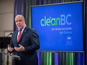 B.C. Premier John Horgan speaks about the provincial government's CleanBC plan aimed at reducing climate pollution, during an announcement in Vancouver, on Wednesday December 5, 2018. FortisBC Energy Inc. says it will partner with Suncor Energy Inc. and Hazer Group Ltd. to build a hydrogen pilot project in Port Moody, B.C. The $11-million pilot project will also be supported with grant funding from the provincial government's CleanBC Industry Fund.THE CANADIAN PRESS/Darryl Dyck