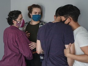 Intimacy co-ordinators Phay Moores (far left) and Megan Gilron (next to Moores) work with actors Chris Carson and Cardi Wong (far right) sorting out a scene in Vancouver director Jason Karman’s feature coming-of-age film Golden Delicious.