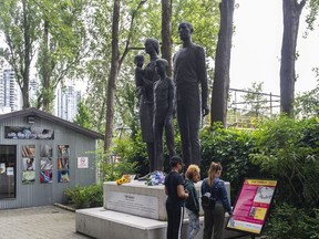 The Family statue by sculptor Jack Harmon has a new home at Creekhouse Courtyard at Granville Island after being in storage for several years. The statue was originally installed at the Pacific Press building building at 7th and Granville Street in the mid-1960's, then moved to the Surrey printing plant until that building was decommissioned several years ago.