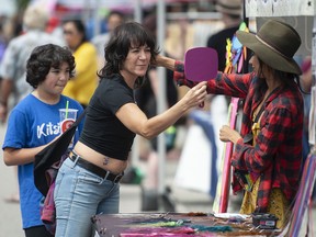 Thousands of people took part in the Khatsahlano Street Party on West 4th Ave. In Vancouver on Saturday. The event, which stretches for 10 blocks along West 4th Ave. is Vancouver's largest free music and arts festival and incorporates area businesses.