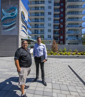 Musqueam Chief Wayne Sparrow with Polygon Homes CEO Neil Chrystal.