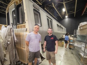 Construction Manager Jacek Scheller (left) and Creative and Casting Director Ryan Purdy present the 48-foot replica subway car built for the Netflix series The Night Agent.  The replica was auctioned off to local company Vancouver Horror Nights.