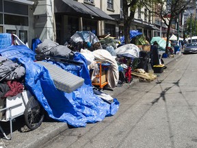 FILE PHOTO of tents lining the sidewalks of East Hastings Street in Vancouver.