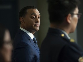 Pictured, IHIT Superintendent Mandeep Muker announces the arrests at a press conference in Surrey, BC on Wednesday, July 27, 2022.