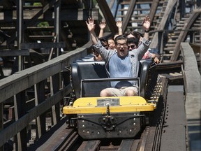 Postmedia reporter Derrick Penner (riding in the first car) on the wooden roller coaster at Playland. The iconic Coaster, in operation since 1958, has recently undergone a retrofit.