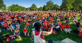 Kat Norris speaks to hundreds of people who attended a memorial, called Remember the Children, held for the victims of the Kamloops Residential School in Grandview Park in Vancouver on June 2, 2021.