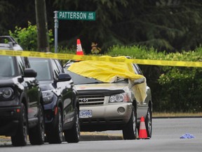 RCMP at the scene of a targeted shooting at 7008 Patterson St. Burnaby on July 4, 2022.