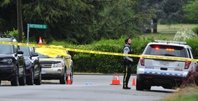 RCMP at the scene of a targeted shooting at 7008 Patterson St. Burnaby on July 4, 2022.