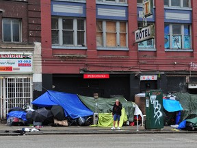 Outside the Regent Hotel on East Hastings Street as tents are pitched on the sidewalks for two blocks in Vancouver on July 6.