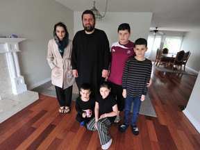 Nisar Ahmed with his children Nadia, 13, Mansoor, 14, Yaser, 10, Ahmed Mudassar, 4, and Najma, 8.
