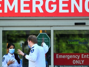 NORTH VANCOUVER, BC., July 21, 2022 - Emergency entrance at Lions Gate Hospital in North Vancouver, BC., on July 21, 2022. 
(NICK PROCAYLO/PNG) 

00096867A [PNG Merlin Archive]