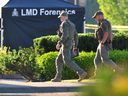 RCMP on scene at a fatal shooting in the parking lot of the Rio Can Langley Centre on 200th St. in Langley, BC., on July 25, 2022.