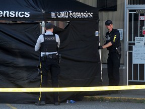 RCMP at the scene of the fatal accident in the parking lot next to the Mission Thrift Store at Logan Avenue and Glover Road. at 200th st. in Langley, British Columbia on July 25, 2022