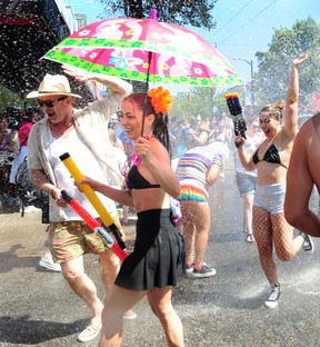 Action scenes from the Pride Parade on Denman St. in Vancouver, BC., on July 31, 2022.