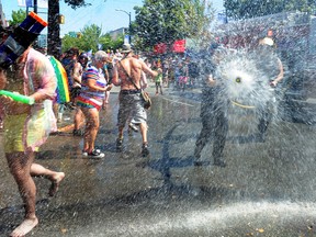 Action scenes from the Pride Parade on Denman St. in Vancouver, BC., on July 31, 2022.