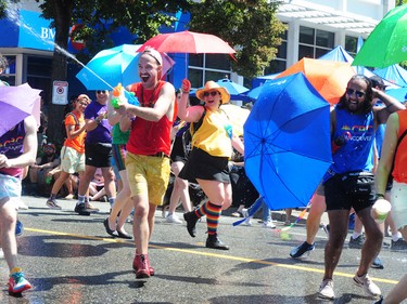 Action scenes from the Pride Parade on Denman St. in Vancouver, BC., on July 31, 2022.
