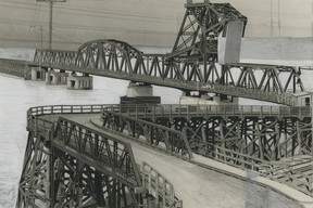 Leonard Frank photo of the first Second Narrows Bridge, circa 1925-1930. The bridge opened on November 7, 1925 and was closed and redesigned after a ship ran into it in 1930. This print has been heavily manipulated so that be better printed in the Province, which directed it.