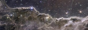 A composite image of the Cosmic Cliffs in the Carina Nebula, created with NIRCam and MIRI instrument data from NASA's James Webb Space Telescope, a revolutionary apparatus designed to peer through the cosmos to the dawn of the universe and released July 12, 2022.    NASA, ESA, CSA, STScI, Webb ERO Production Team/Handout via REUTERS