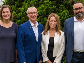 Surrey First mayoral candidate Gordie Hogg and incumbent councillor Linda Annis, flanked by party candidates Mary-Em Waddington (far left) and Bilal Cheema (far right), are taking a run at Surrey City Hall.