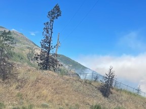 A.D. July 15, 2022 A wildfire is seen burning near Lytton. Photo: Wendy McClellan