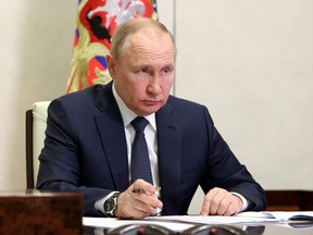 Russian President Vladimir Putin chairs a meeting of the Council for Strategic Development and National Projects via a video conference call at a residence outside Moscow, Russia July 18, 2022.