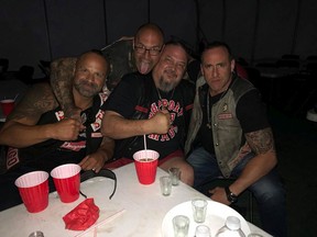Murdered Hells Angel Chad Wilson (left) with Zale Coty (third from left).
