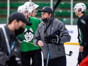Mike Babcock leads the Huskies through a practice session at Merlis Belsher Arena this past February.