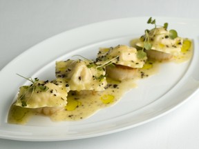 Pea and mascarpone ravioli with grilled scallops, truffled beurre blanc.