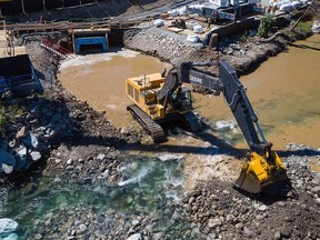 Protect the Planet says this recent aerial photo taken by a drone shows excavators working on the Trans Mountain pipeline expansion in the Coquihalla River near Hope.