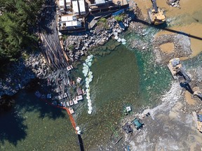 Protect the Planet says this recent aerial photo taken by a drone shows excavators working on the Trans Mountain pipeline expansion in the Coquihalla River near Hope. Receive Aug. 9, 3033. Credit: Protect the Planet