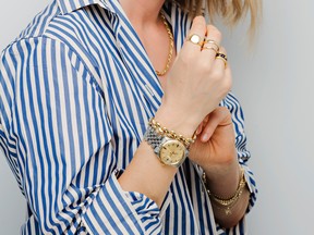 Founder Megan Mensink wears pieces from her vintage jewelry line Folklor.