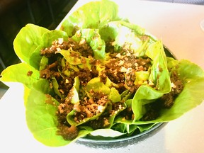 Lettuce with warm spot prawn and sablefish offal XO at the Elephant restaurant in Vancouver.