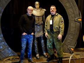 ctor Gary Jones (left) who played Command Master Sgt. Walter Harriman for a decade on Stargate SG-1 and Stargate fan and Empire Movies Memorabilia owner Richard Johns (right) in front of one of Johns Stargate props.