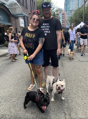 Frenchies Bonnie (left) and Zeus (right) with Nicole Tapia and Adam Beaulieu at the Just Love Animal Society’s Pet-A-Palooze in Vancouver’s Yaletown on Sunday, Aug. 28, 2022.